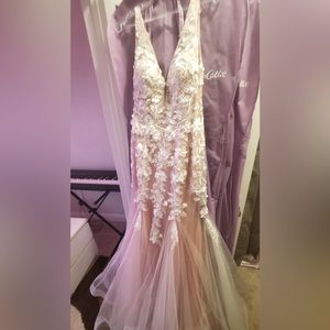 Jovani white/cream wedding dress. Brand new with no tag. But receipt available.